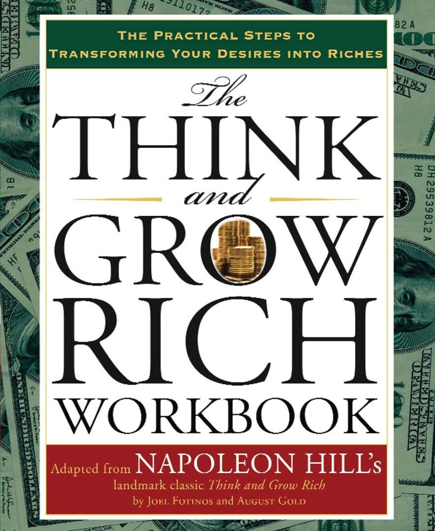 A book cover with money and the words " think and grow rich workbook ".